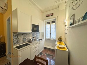 Apartment, 1 Queen Bed with Sofa bed, Kitchenette, City View | Private kitchen | Espresso maker, electric kettle - Satrico43 - ChiacchioProperty (Rome)