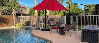 Cozy 4-bedroom home with spacious loft, pool, & game room in Litchfield Park