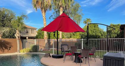Cozy 4-bedroom home with spacious loft, pool, & game room in Litchfield Park