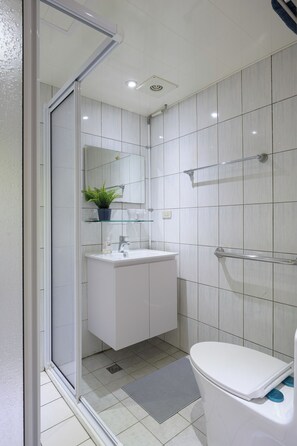 Shower, hair dryer, towels, soap