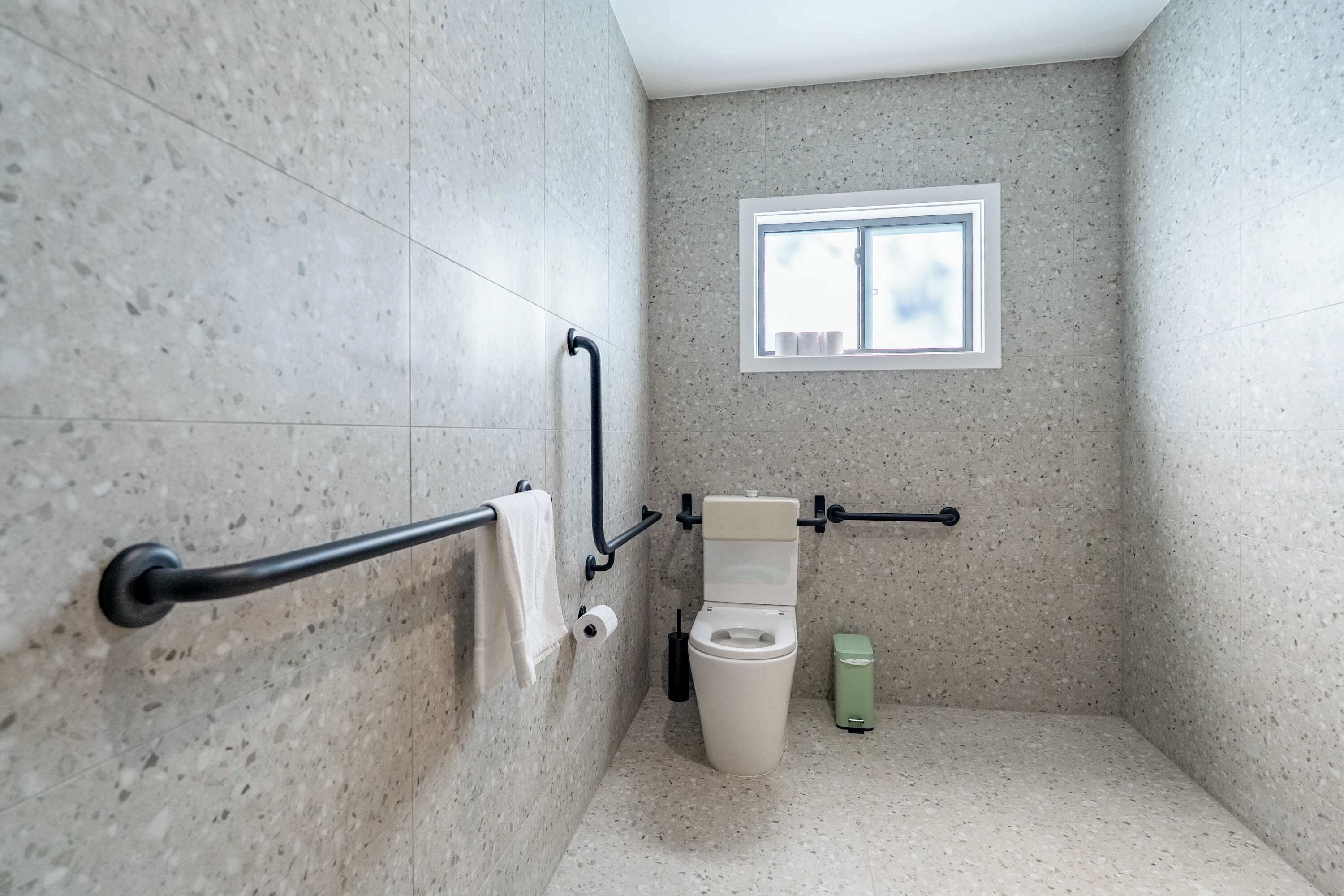 Shower, hair dryer, towels, shampoo