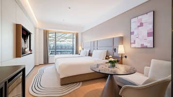 Premium bedding, down duvets, memory-foam beds, free minibar