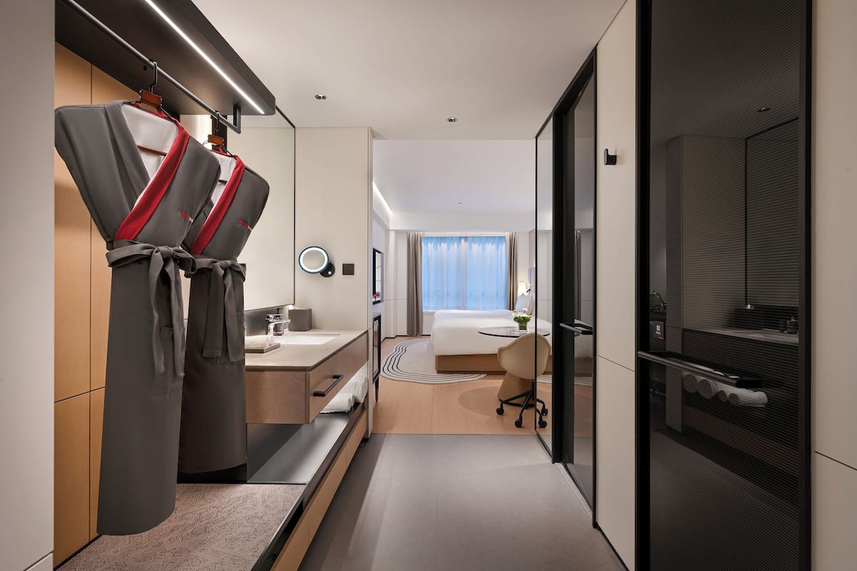 Superior Double Room, Non Smoking, City View | Living area | 165-cm LED TV with satellite channels, toys, books