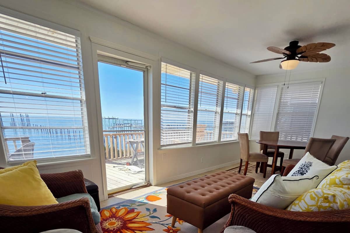 Signature House, 3 Bedrooms, Patio, Bay View | Living area | 45-inch Smart TV with digital channels