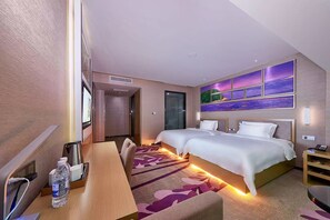 A hotel room with two beds, a desk with a chair, a TV, and a large window. - Lavande International Hotel Pazhou Convention & Exhibition Center Eastxiaonan Metro Station Branch - Free Deliver Service to Guangzhou Baiyun International Airport & Free Shuttle Bus to Canton Fair Complex During Canton Fair Period (Guangzhou)