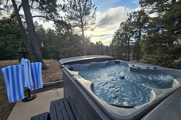 Relax under the stars in the hot tub.