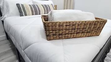 2 bedrooms, desk, iron/ironing board, travel crib