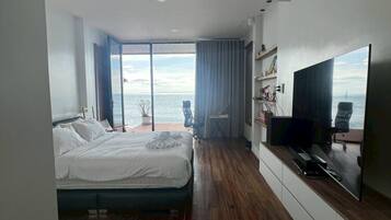 Deluxe Suite, Patio, Sea View | Blackout drapes, free WiFi