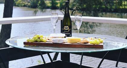 Set on the Wallamba river. Beautifully appointed 2 bedroom cottage. Pets welcome
