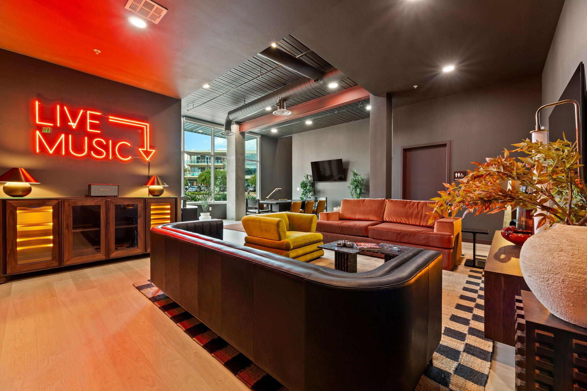 Let Austin's music-loving spirit set the mood, with colorful lounge seating and a glowing LIVE MUSIC sign.