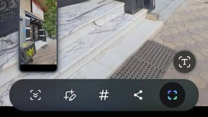 A building facade with ornate black and gold metalwork, a marble entrance, and a small inset photo of the building's interior. - Executive Exclusive Cairo Mohandessin Giza Apart. (Gazirat Mit Oqbah)
