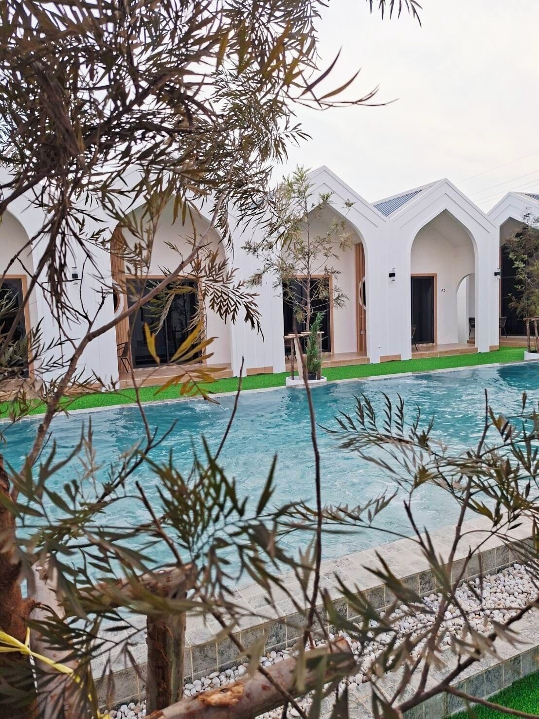 Chambre Quadruple Deluxe, non-fumeurs, vue piscine | Wi-Fi gratuit