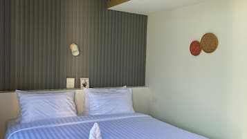 Deluxe Quadruple Room, Non Smoking, Pool View | Free WiFi