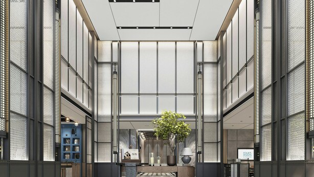 En moderne lobby med et skakternet gulv, en central receptionsdisk og en stor stueplante.