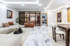 Serenty | Living area | 50-inch Smart TV with satellite channels, Netflix, smart speakers - Sky view (Rabat)