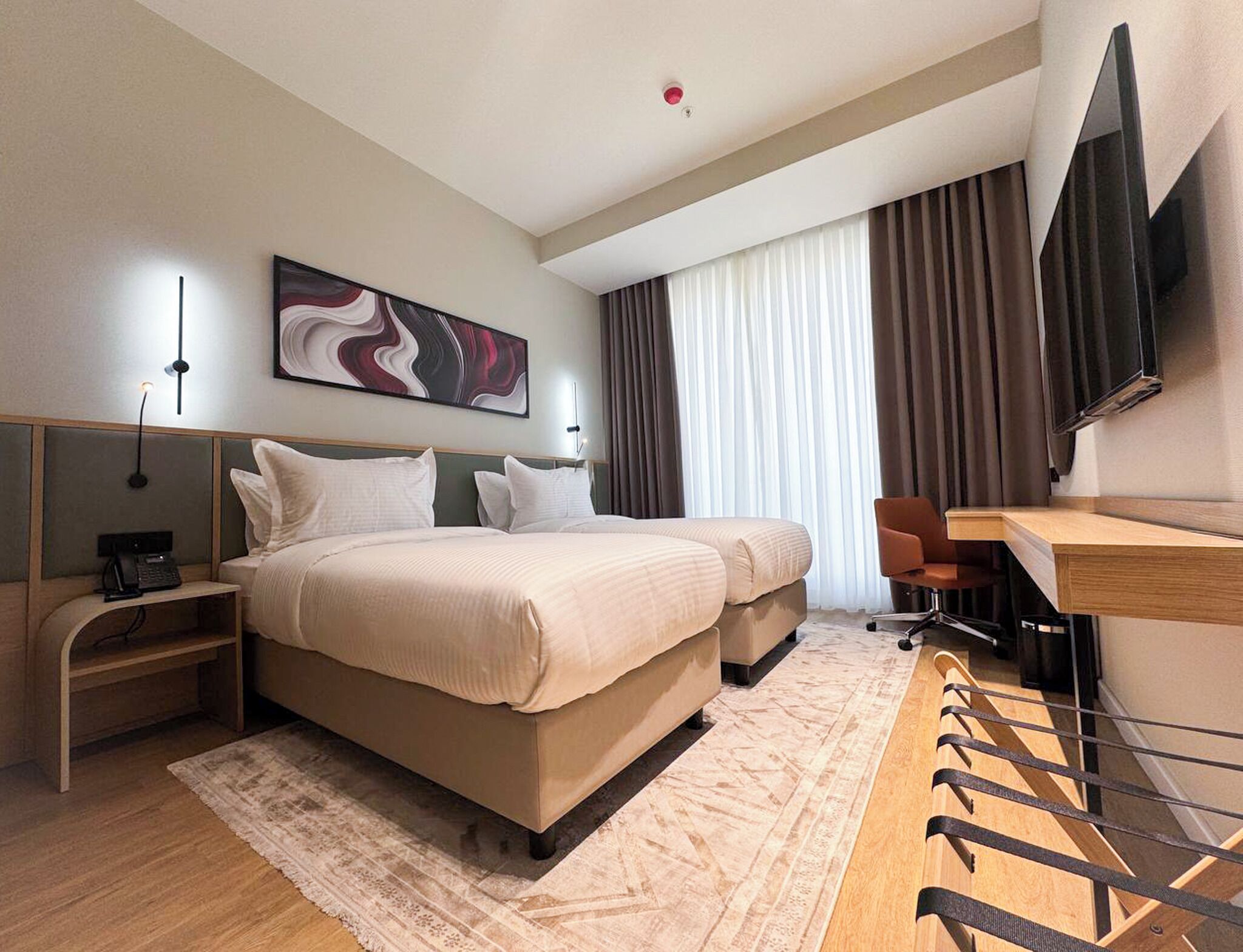 Standard Room, 2 Twin Beds | Minibar, in-room safe, desk, laptop workspace