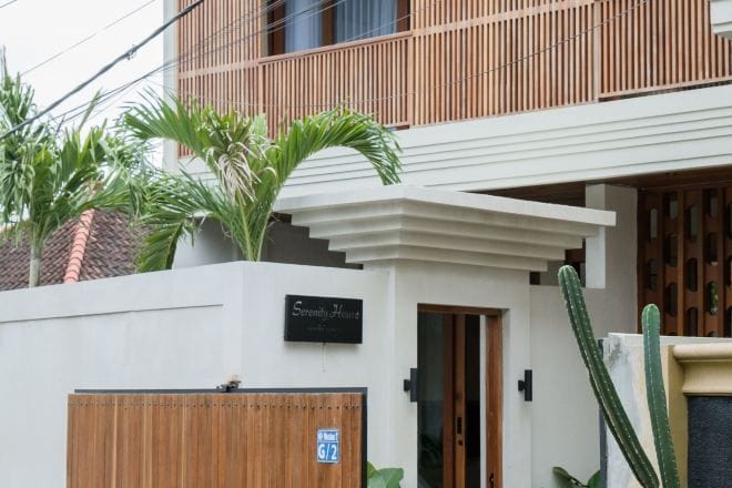 A modern building with a sign reading "Serenity House."