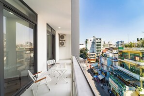 Quarto família, vista para a cidade | Sacada
