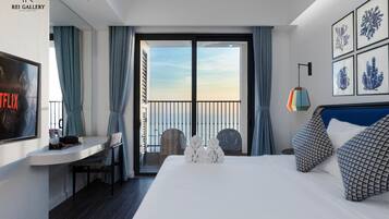 Deluxe Studio, 1 Queen Bed, Balcony, Bay View | Premium bedding, minibar, individually decorated, individually furnished