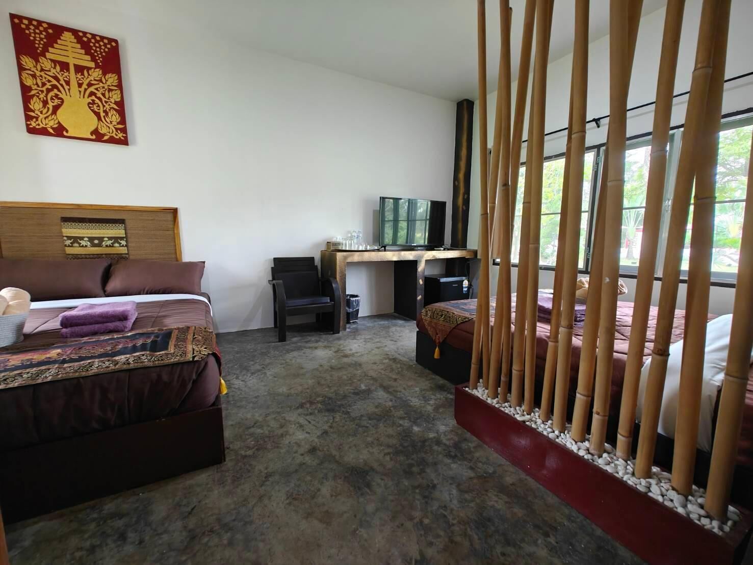 ห้องแฟมิลี่ดับเบิล, ระเบียง, วิวสวน | Wi-Fi ฟรี