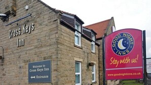 A stone building labeled "Cross Keys Inn" with a sign indicating the entrance. - Premier Inn Middlesbrough South Guisborough (Guisborough)