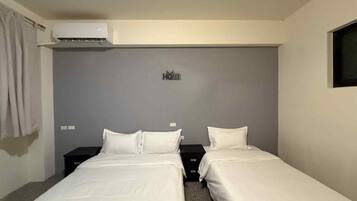 Basic Twin Room, Courtyard View | Laptop workspace, free WiFi