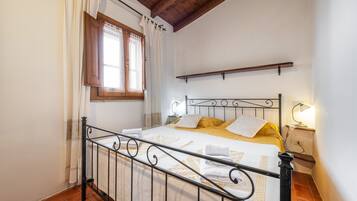 Fer et planche à repasser, draps fournis