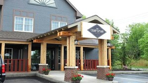 A building with a sign reading 'The Craftsman.'