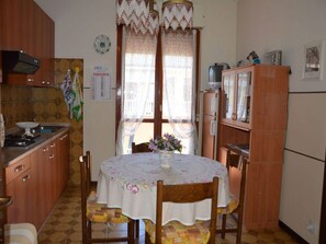 Fridge, stovetop, cookware/dishes/utensils