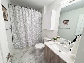 Shower, hair dryer, shampoo