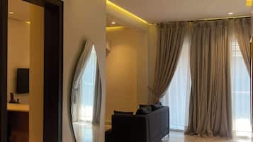 Family Apartment | Living area | 40-inch Smart TV with cable channels, Netflix, streaming services