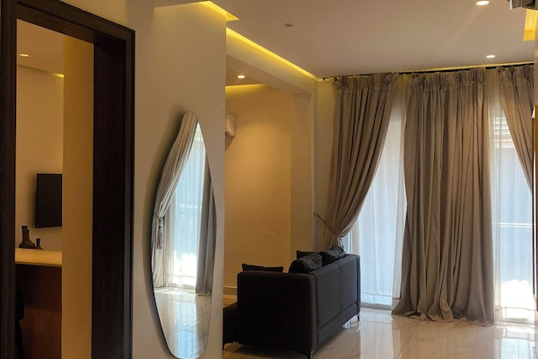 Family Apartment | Living area | 40-inch Smart TV with cable channels, Netflix, streaming services
