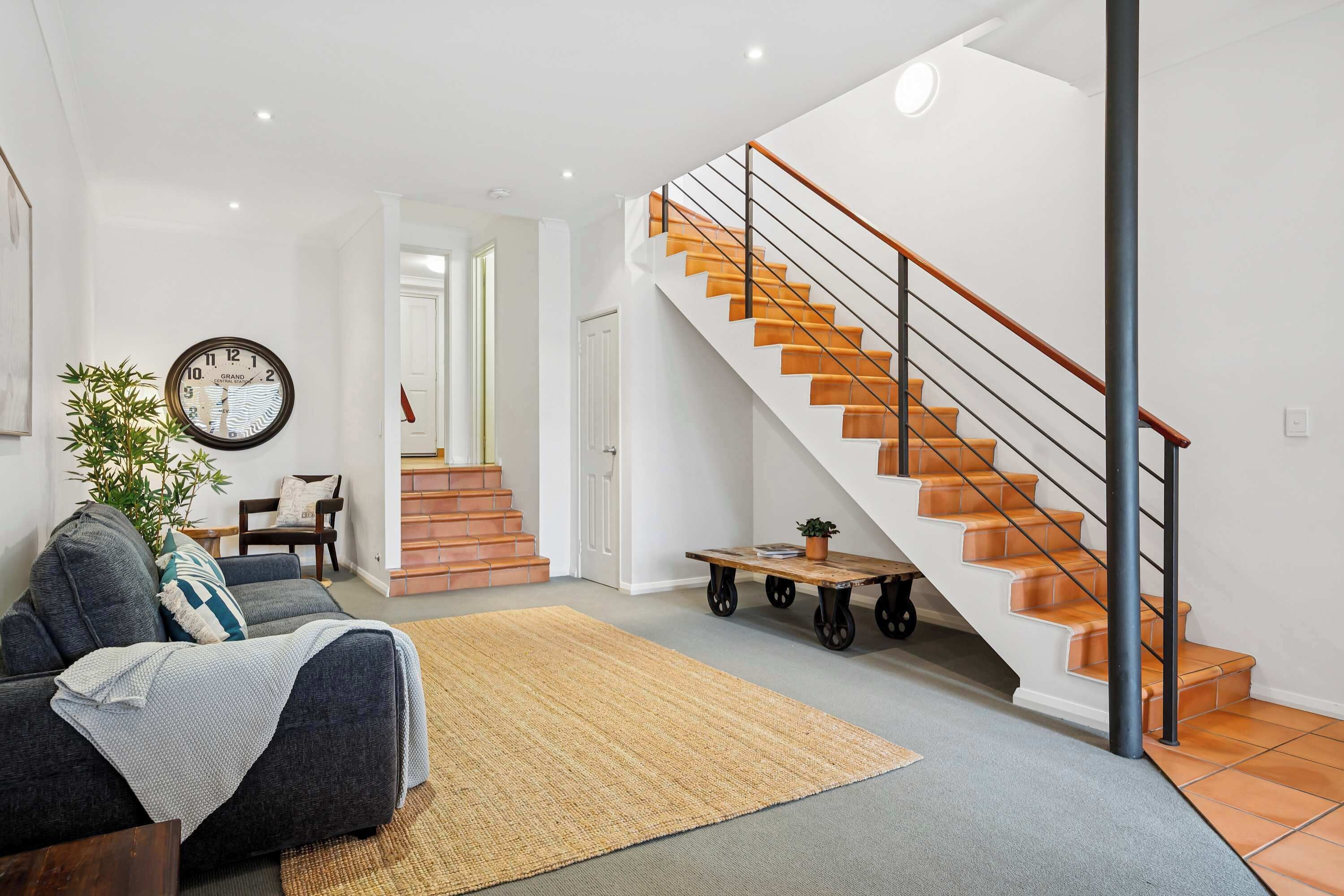 Living Comfortable lounge space with stylish decor and plenty of natural light.
