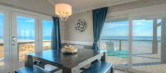 Experience coastal bliss at Just Beachy, a 4-bedroom oceanfront retreat in Oak Island.