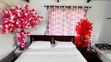 Habitación triple estándar | Ropa de cama