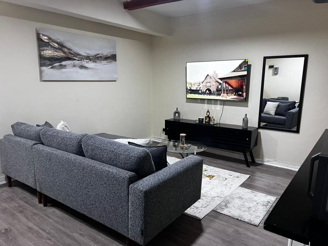Luxury Apartment, Balcony, City View | Living area | Flat-screen TV