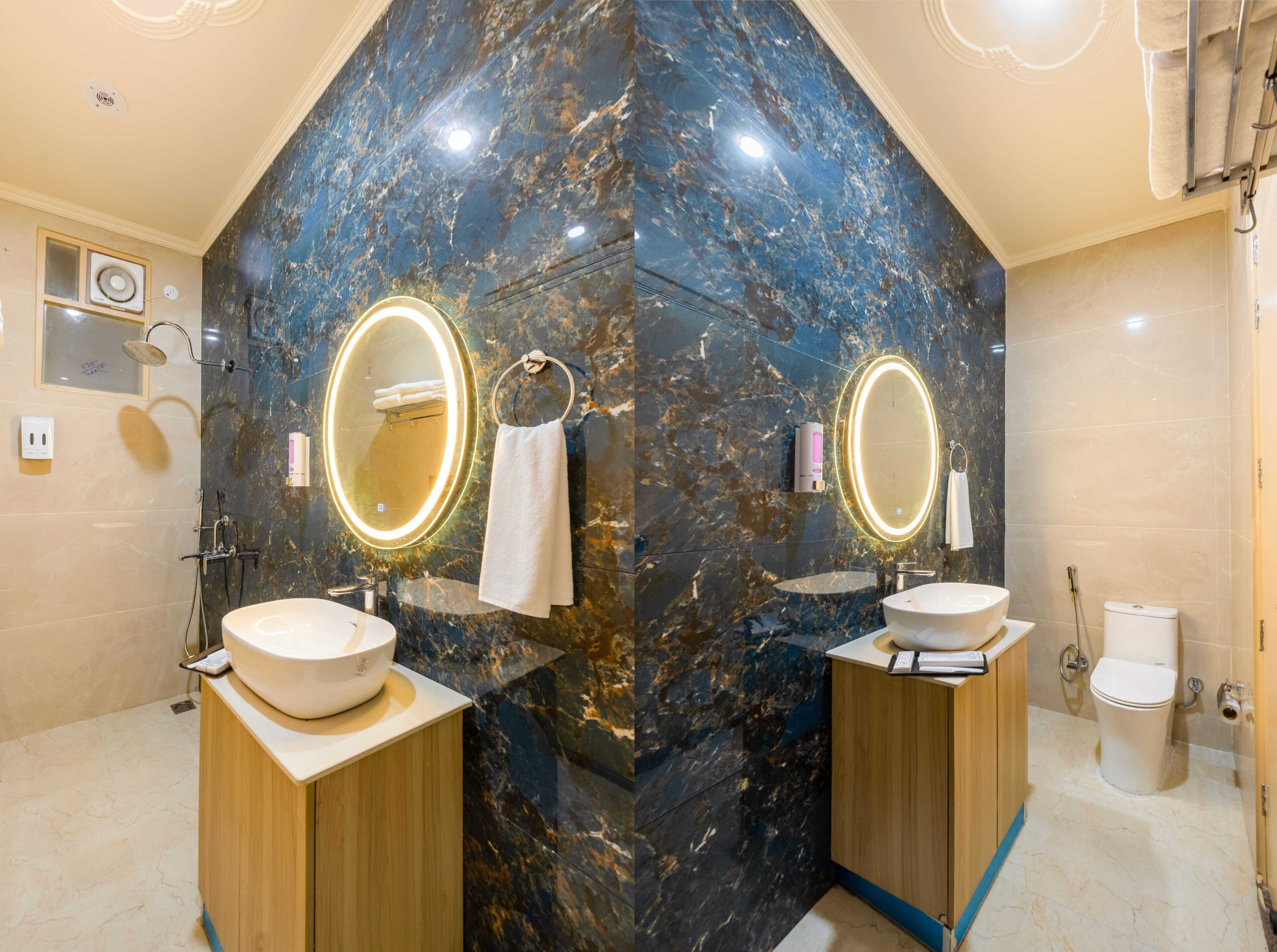 Executive Room | Bathroom | Shower, towels, soap, shampoo