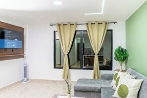 Living area - 2 room apartment with private patio very close to chipichape (Cali)