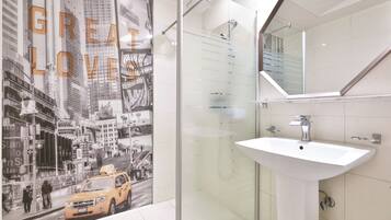 Superior Room | Bathroom | Hair dryer, towels