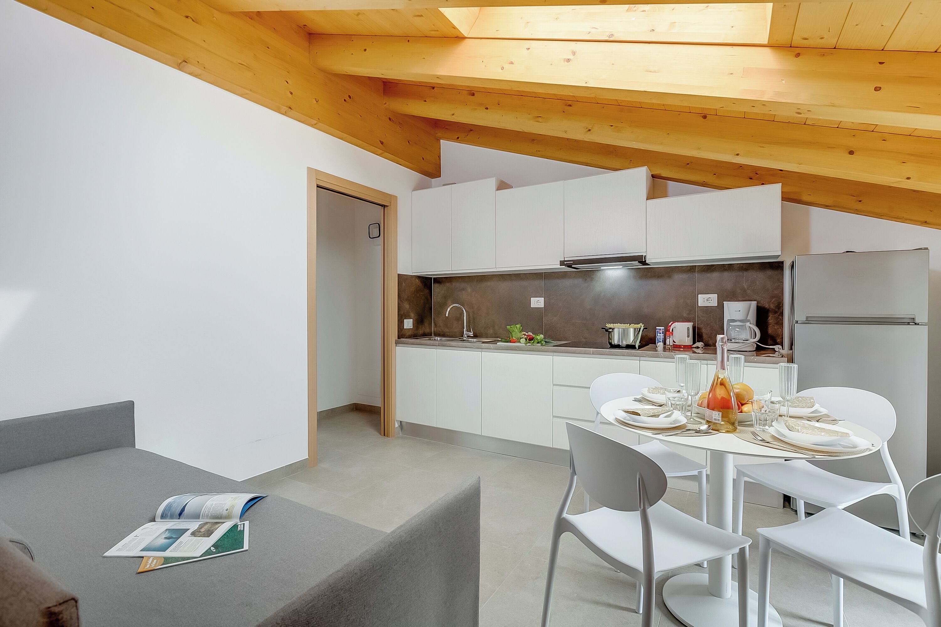 Family Apartment, Multiple Bedrooms (Residenza Lugana - Apt 6) | Private kitchenette | Fridge, microwave, stovetop, coffee/tea maker