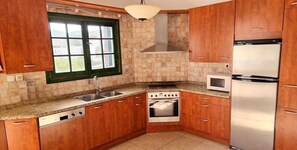 Private kitchen - Village Apartments (Malevizi)