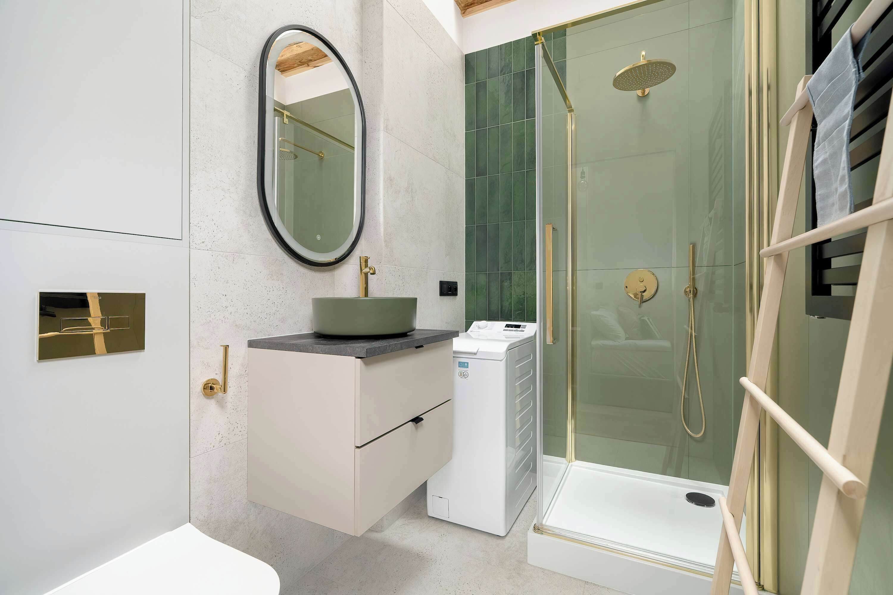 A modern bathroom with a freestanding bathtub, a glass-enclosed shower, and a built-in sink with a mirror.