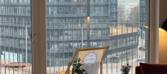 Maison Ébène, warm, premium, and attractive for couples & business travelers.