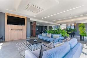Luxury Apartment, Balcony, City View | Living area - The Henlee Apartment Sandton (Sandton)
