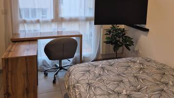 Desk, free WiFi, bed sheets