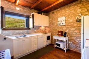 House, Partial Sea View | Private kitchen | Espresso maker, electric kettle, highchair