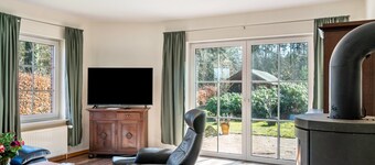 Holiday Home 'Friesenwald' with Private Terrace, Shared Garden, and Wi-Fi