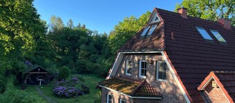 Holiday Home 'Friesenwald' with Private Terrace, Shared Garden, and Wi-Fi