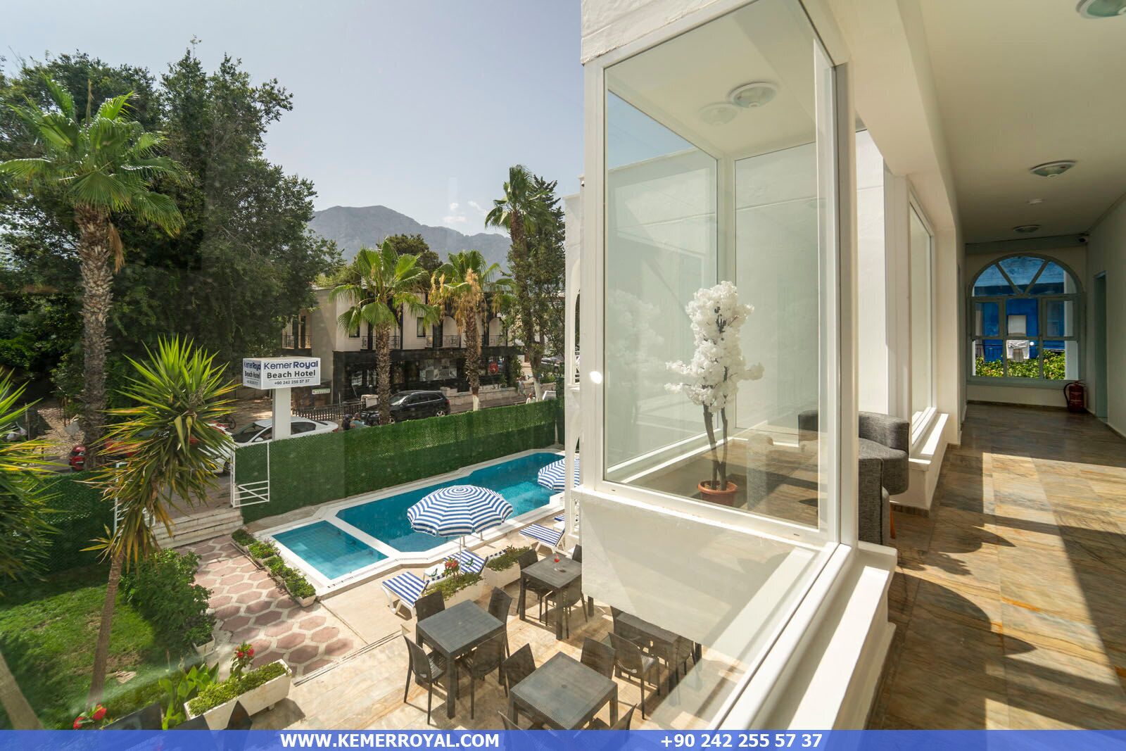 Deluxe Double Room, Balcony, Pool View | Pool | Seasonal outdoor pool, open 8:00 AM to 7:00 PM, pool umbrellas