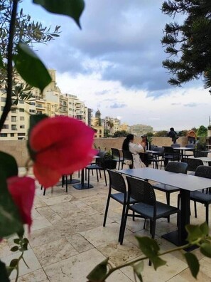 Outdoor dining - Inhawi Hostel (St. Julian's)